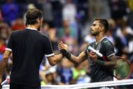 Sumit Nagal greets Roger Federer after their 2019 US Open match.
